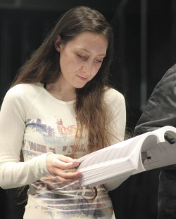 Elizabeth Sanchez reads her script during Tuesday's rehearsal for RENT.
