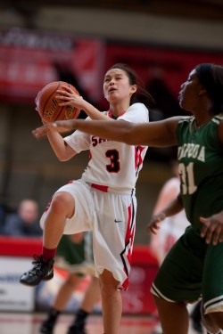 Freshman Chanel Celis (pictured above at Saturdy’s game aginst Umpqua) had seven rebounds in the Saints’ 108-65 loss to Clackamas Community College on Wednesday night.