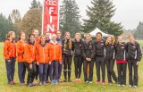 The women’s cross country team takes a picture with Treasue Valley’s cross country team. Both teams tied for second place in the Southern region championships on Oct. 26