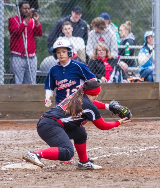 Freshman first baseman Megan Reed makes the force-out at first during a Tuesday game against Lower Columbia.
