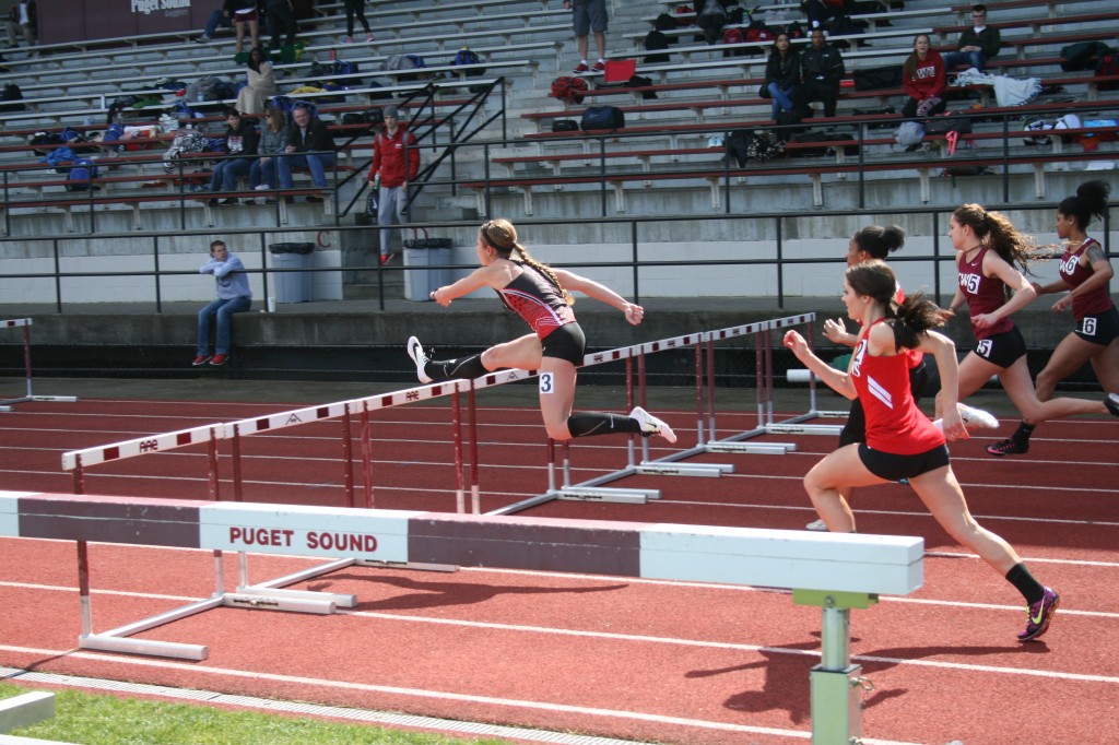 Saints sophomore Courtney Andre hurdles in the 30th JD Shotwell Invitational. She won with a new personal best of 14.82 in the 110-meter hurdles.