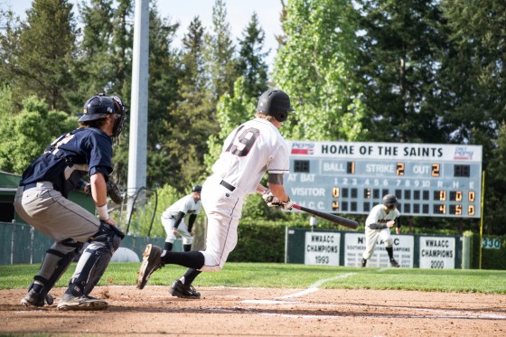 Saints sophomore left fielder Clark Bryant connects in the bottom of the first in the Saints’ 9-3 victory over the George Fox JV on Wednesday.