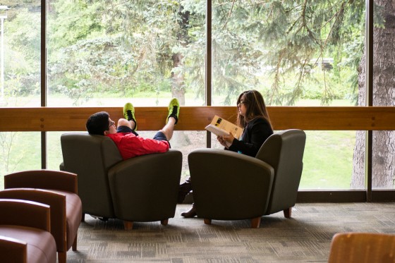 Christian Urzua (left and Alma Pacheco (right) lounge in the Student Union. Their terms as president and vice-president come to a close at the end of June.