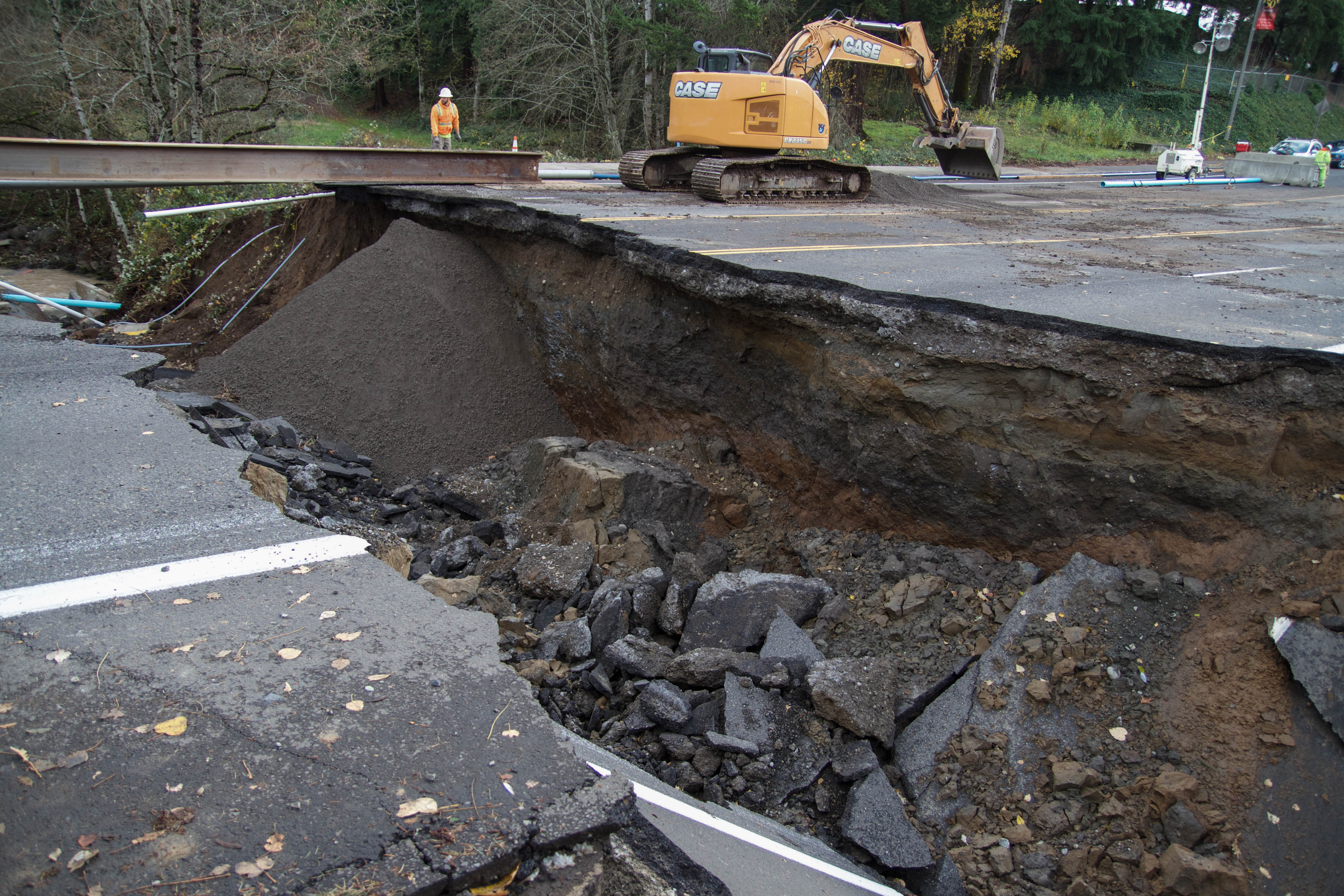 Image of the sinkhole days after the initial rupture, after being further demolished to expand across the whole street. Taken by Nick Pelster.