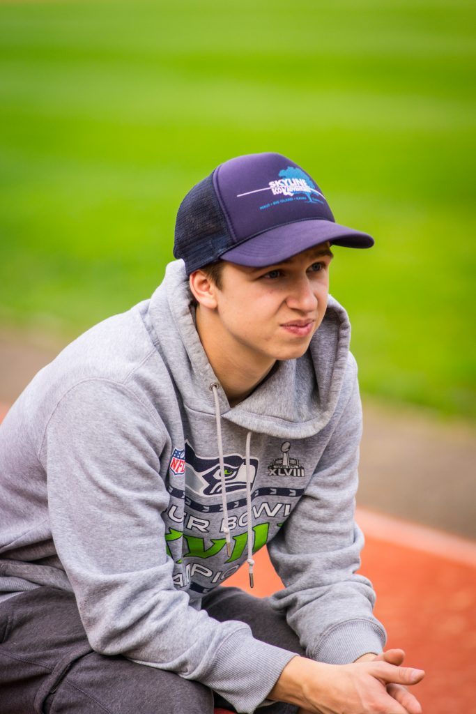 Terek Thornburg sitting out during practice with his injury. Photo by Davyn Owen