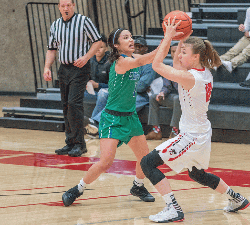 Freshman guard Makenzie Whitney pulls down a rebound on Nov. 20 in the Saints’ 67-43 win over Edmonds. She had a game high of nine points in Walla Walla. 