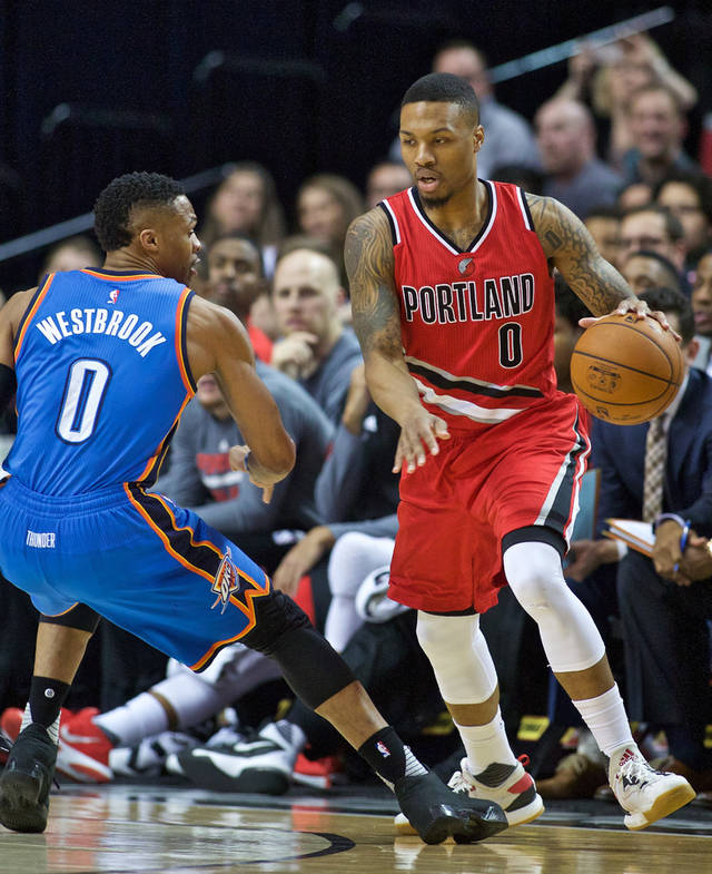 Damian Lillard (right) is averaging his career high 25.7 points per game this season. Russel Westbrook (left) is averaging a tripple double this season.
