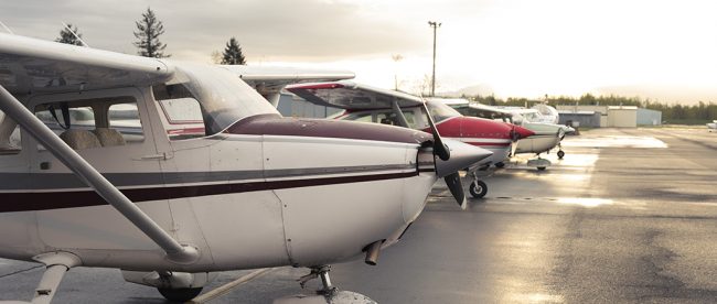 A lineup of some of the planes at the Troutdale airport, photo by Alex Crull. 