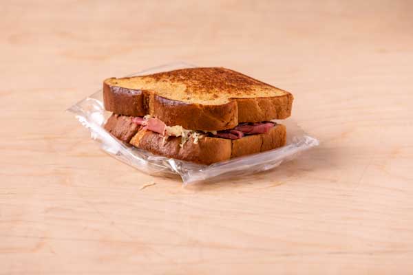 Photograph of a $5.79 grilled sandwich on a plastic wrapper from the cafeteria on campus.