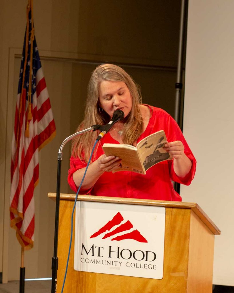 Diana Kirk at the Mouths of Others event, reading from her autobiography to the audience. 